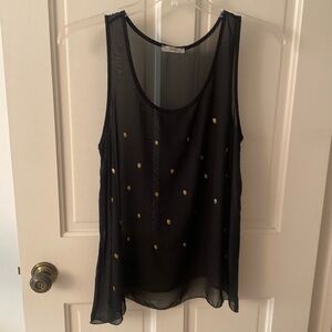 ISSI gold studded skull hi low sheer tank top.
